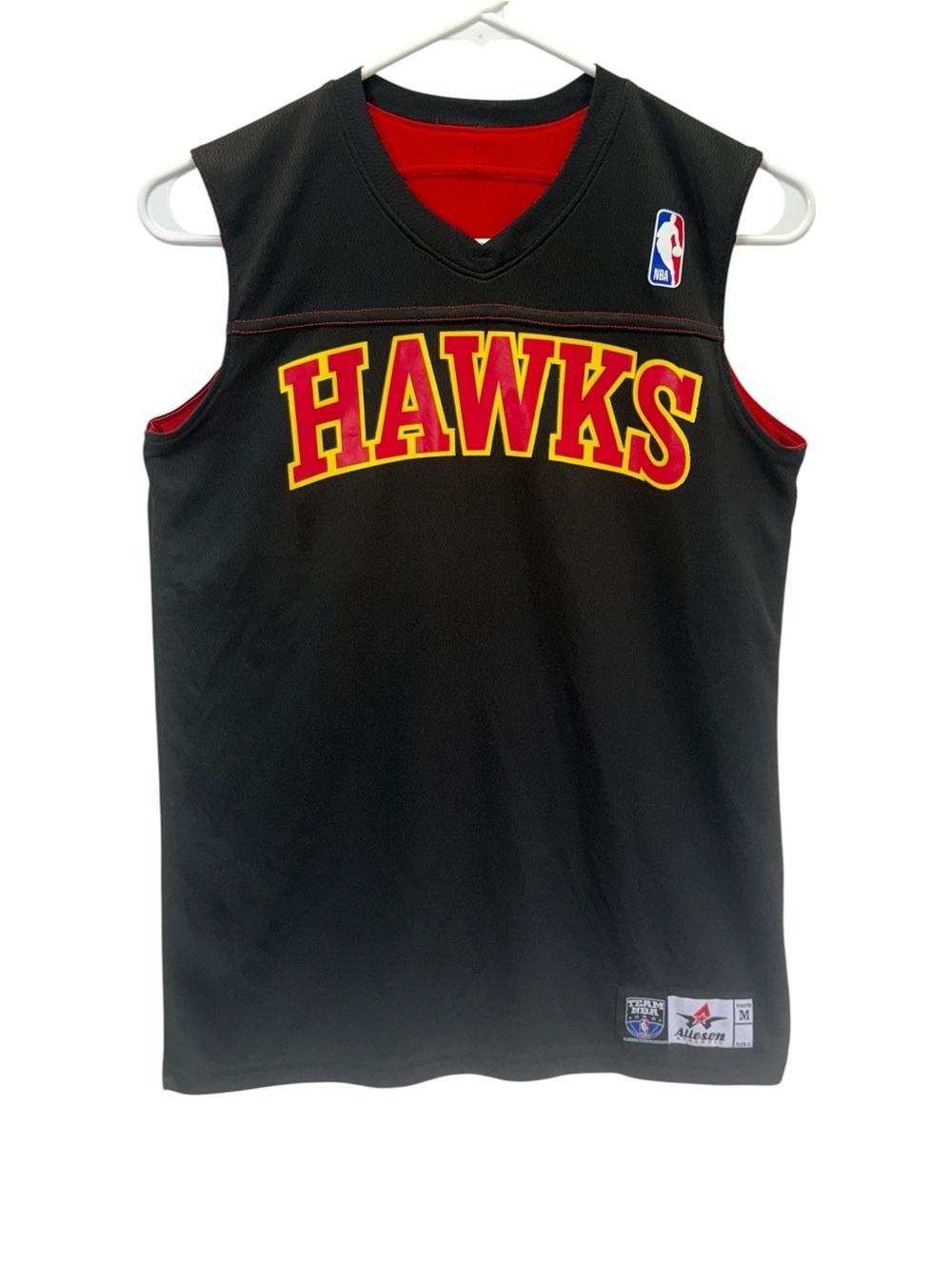 Atlanta Hawks Youth Black & Red NBA Reversible Basketball Jersey.
Size Youth M